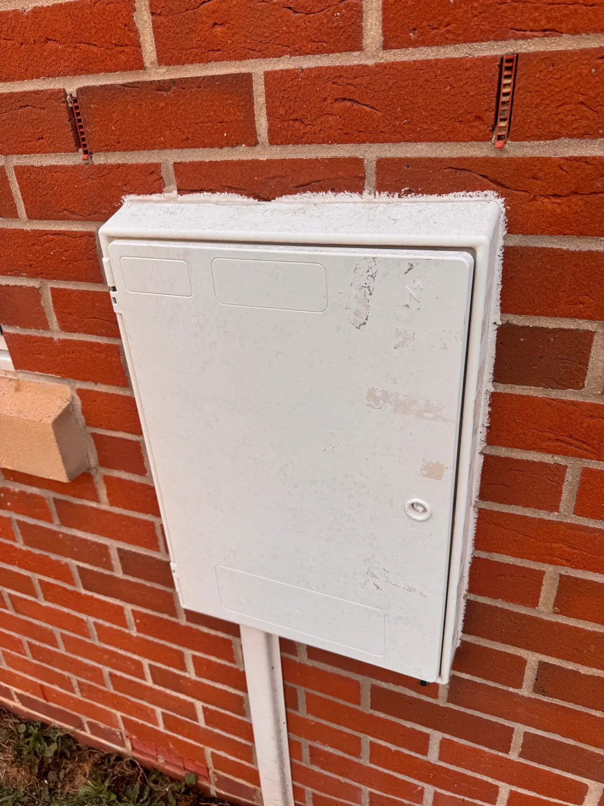 Solid-front exterior meter box after cleaning