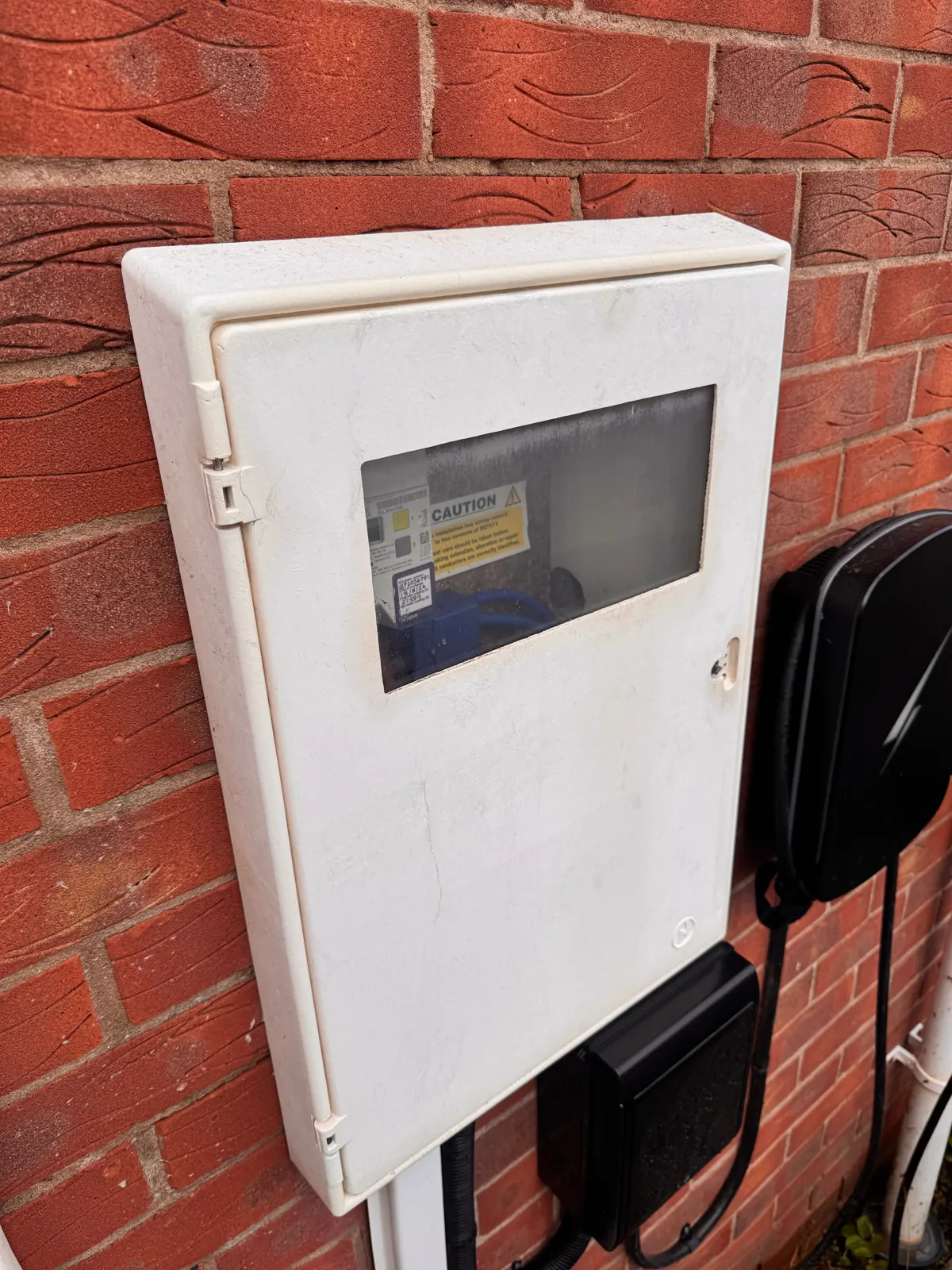 Exterior meter box with a glass window after cleaning